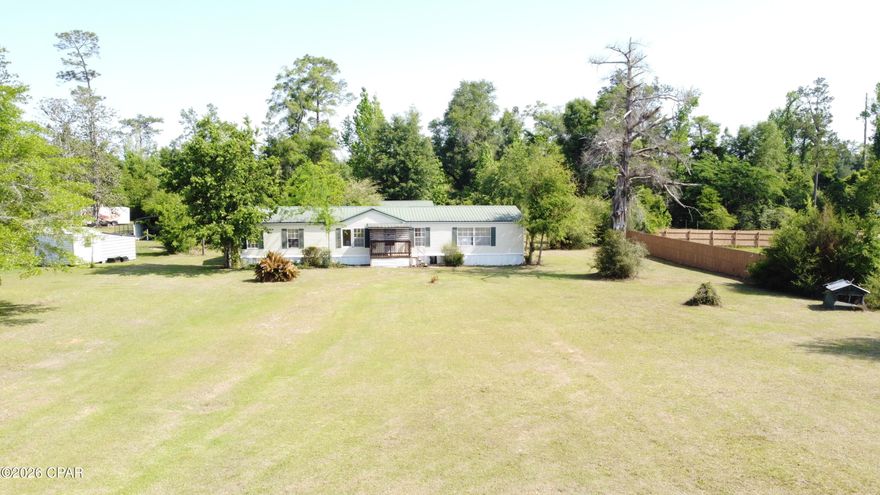 Fantastic opportunity to own at this location. Plenty of upside potential with this one. Over 1800 sqft on 1 acre. Also has a detached finished out building that would make a great office or music room. Home needs some repairs and updates but priced with plenty of room. Power is on and well works. Would make a great rehab to sell or long-term rental. Laminate floors in most of the home. Metal roof. Cash offers only due to repairs needed.