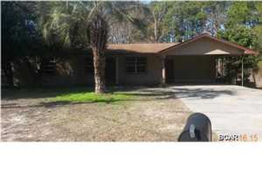 Live in a quiet area but only 7/10ths of a mile from the beach! Screened porch with metal roof, 8' x 17' laundry room with sink and extra cabinets, 16 x 24 workshop with 8 x 24 shed awning, sprinkler system with separate well and more! Wonderful investment property, very good bones, nice shady treed level lot and very convenient location. Make your appointment today!!