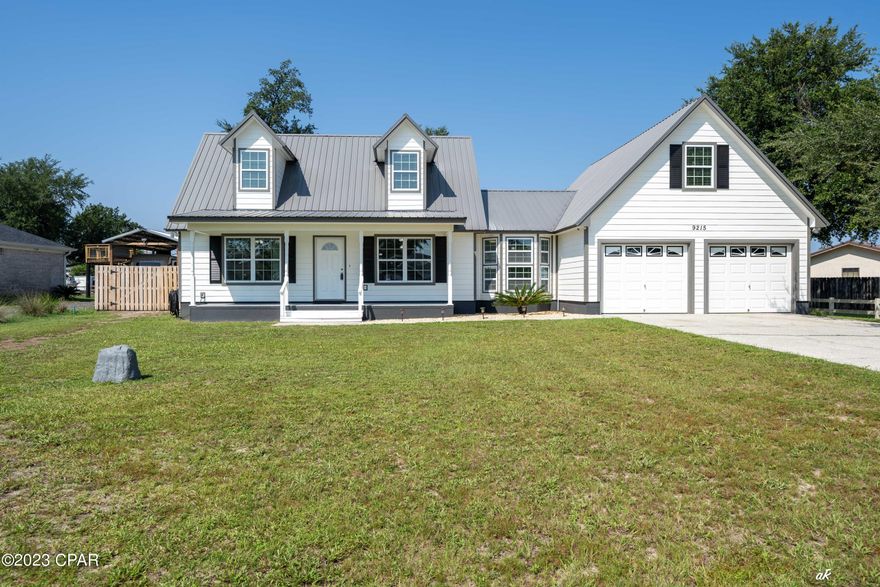 CURRENTLY UNDER CONTRACT. SELLER ACCEPTING BACKUP OFFERS.  You don't want to miss this fully renovated 3 or 4 bedroom home and 3 full baths with multiple living spaces situated on 1/2 acre lot.  This home has had a complete renovation with premium metal roof and underlayment put on along with all new exterior Hardie Board siding and windows.  Lovely 25' covered porch across the front of the home.  Kitchen boasts brand new cabinets, custom glass backsplash, stainless appliances and pantry.  Great room has a wood burning fireplace and overlooks the deck and huge backyard.   Master suite is downstairs plus there is an extra full bath downstairs for guests. Upstairs has a min-split unit for the huge loft/bonus room space.   This could be used as a playroom, office, hobby room, gym, extra living space or even could be turned into a fourth bedroom.  The two bedrooms upstairs have a Jack and Jill bath for more privacy. Large half acre lot with nice open deck off greatroom, privacy fenced backyard, oversized 2 car garage, .  Lots of room to play, relax and enjoy the great outdoors.  There is room for a pool or workshop if you wanted to build one. SELLER IS PROVIDING A HOME WARRANTY.