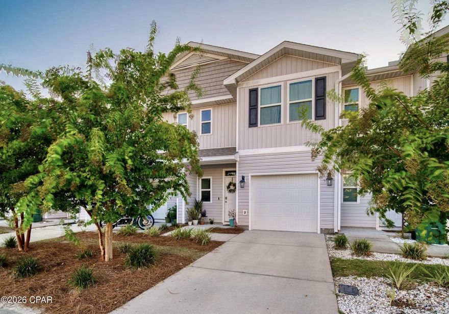 Welcome to this stylish 3 bedroom, 2.5 bath townhome designed for comfort and convenience. Vinyl flooring flows through the main living areas, with cozy carpet upstairs and in the bedrooms. The open concept kitchen features laminate countertops, a breakfast bar, and Frigidaire appliances including a stove, microwave, and dishwasher. The HOA includes access to the community pool and covers yard maintenance for easy living. Conveniently located just seconds from shopping, dining, and down the street from the Tyndall Air Force Base.