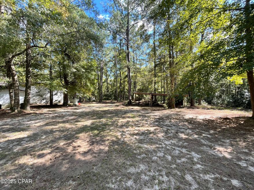 Fisherman's paradise! Lot number 3 is a 70'x120' lot on Smokehouse Rd. Perfect for a manufactured home or to maybe park your RV on while you're visiting the area. Purchase by itself, or in combination with Lot 4 (which has a well and power pole) or Lot 4 & Lot 5(which has a small pole barn, RV power hookups, and septic system). If you're needing a home, this lot can be purchased with the manufactured home at 696 Smokehouse Lake Rd (Lots 1&2).
The community has a boat ramp with Choctawhatchee River access. Located only minutes from Freeport and the beaches of South Walton! This property is perfect for your weekend getaway, investment, or to raise a family.