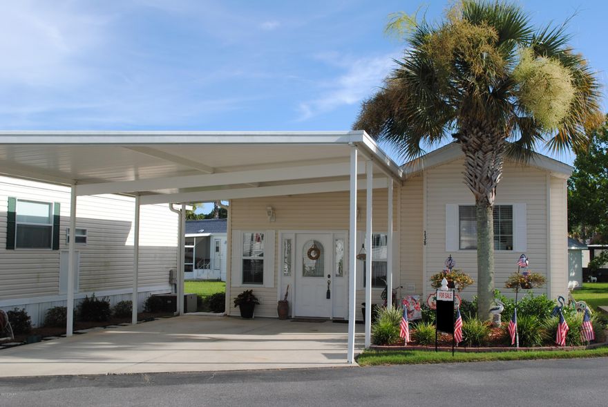 Make an offer on this beautifully landscaped home located in the highly sought after Emerald Pointe Resort. Excellent primary, 2nd residence or rental property. The home features 3 large bedrooms, spacious kitchen, 2 large bathrooms, enclosed Florida Room with EZ Breeze Vinyl Windows, full size washer/dryer, refrigerator, and fruit producing orange tree. Recent updates include a NEW ROOF, A/C UNIT, HOT WATER HEATER AND LVP FLOORING. Dining Room table, beach themed wall pictures and 3 OVHD TV’s will remain in unit. Community offers a large clubhouse, exercise room, 2 pools (1 heated seasonally), hot tub, lake w/boardwalk, playground, and shuffleboard court. HOA includes: water, sewer, garbage, cable, and lawn service. Information is approximate and must be verified by buyer if important