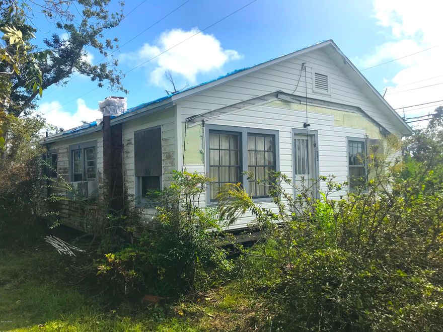 AMAZING fix & flip or investment opportunity for this historic 3 Bedroom / 1 Bathroom home in Panama City! The home is 1,216 total sqft. on a big corner lot, just 2-3 blocks from all of the amenities and shopping of S. Tyndall Parkway. The home had damage from Hurricane Michael but has already been gutted and is ready for rehab! AND all of the construction materials at the home ARE INCLUDED in the sale - Except for the green tractor in the yard, which does not convey. Don't wait to see this one because IT WILL NOT LAST LONG AT THIS PRICE!     ----- CASH BUYERS ONLY -----