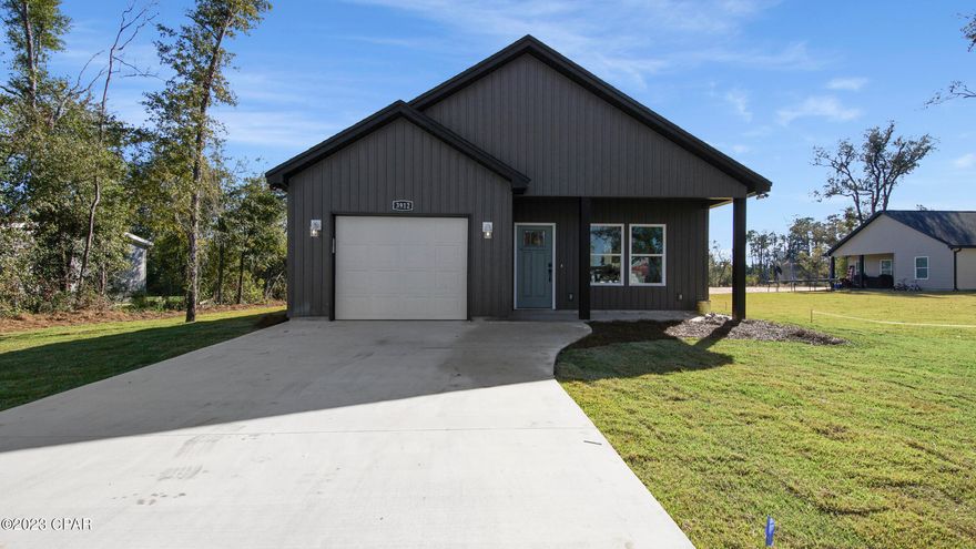 New Construction Home built by G6 Development, located in Southport, Florida. This beautiful home features an open concept floorplan, recessed lighting, vinyl plank flooring, center island/breakfast bar with gorgeous granite, white cabinets, stainless steel appliance package, oversized pantry, large laundry room, fabulous custom built mud room bench with storage, carpeted bedrooms, master suite includes a walk-in closet, master bath has double vanities with middle sit-down area and granite tops. Home sits on a nice sized lot, with septic system installed and connected to County water. 1 Year Builders Warranty provided at closing.