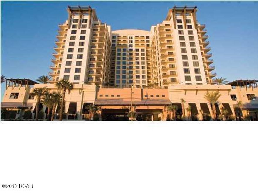 Owner says bring an offer! Newly updated. New flooring. New drapes. New furniture. Fully furnished, turn key rental ready, fabulous amenities. Easy Beach Access across from Sharky's. Perfect location just steps from Gulf World, less than a mile from Pier Park, Frank Brown Park and convenient to Northwest Florida Beaches International Airport. Fully equiped kitchen. Balcony overlooks pool area with beautiful Gulf view of the afternoon sunsets. The Grand Pool Terrace is elevated with view of gulf. It is a heated zero-entry pool and hot tub, dining terraces with commercial stainless grills. Your family will love the Bamboo Room Theater. Call for your showing today!