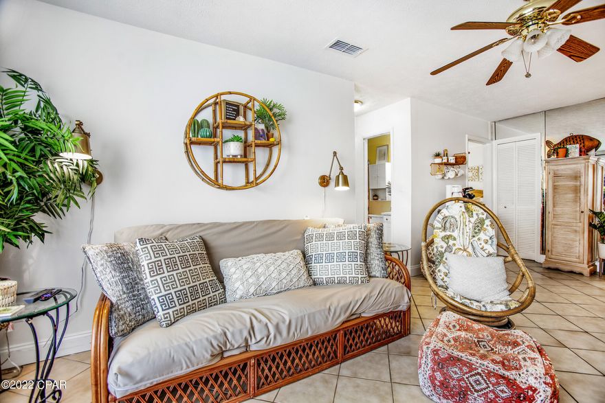 LOCATED IN THE BUILDING CLOSEST TO THE BEACH.  The popular Endless Summer complex is located on the ''quiet'' west end of the beach. LOWEST PRICE CONDO IN THE COMPLEX. This beautiful 2nd floor condo is located in building A which is directly across the street from the beach. The cross walk is in front of the complex and has flashing lights. You can be on the sand in less than 4 minutes. You are only 3 miles from Pier Park. Endless Summer has two spacious pools and a spa. There is a lot of open grass for the kids to play. Parking  on side of condo, No parking deck to navigate. The condo comes furnished and is rental ready but could be sold unfurnished for a lower price. It comes with 1 year  warranty. The AC, Stove and Frig were purchased in 2019. Great Price, close to the beach.