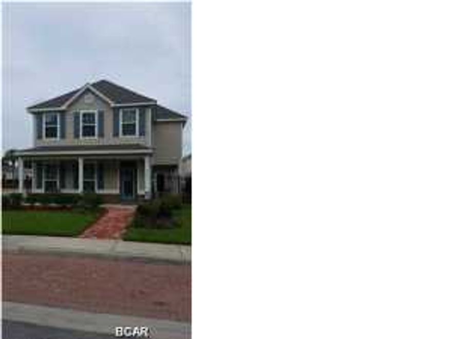 When you are a resident of Magnolia Bay Club you will be flourished with great amenities and features. Such luxuries include a beautiful view of St. Andrew Bay, heated and tropical pools, a gated community for top security, beautifully-designed landscapes with attention to detail, as well as a fitness center and billiards room. Also, you are just minutes from your favorite restaurants and shopping or lazy days on the beaches. The Ole Southside floor plan just drips southern charm . . . with a verandah on the front and a wraparound back porch you will feel at home all you'll need is a mint julep! The downstairs has a large family room, dining room, powder room, storage closet and a fabulous kitchen. The breakfast nook, which the wrap porch surrounds, can be used for a nook or maybe