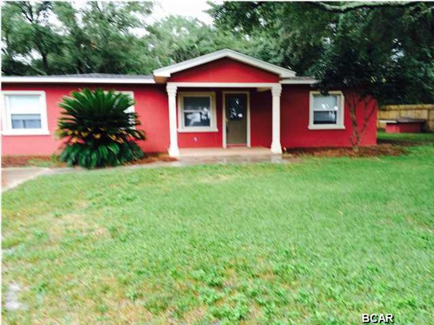 Completely renovated... This home is walking distance to Gulf Coast Community College and FSU-PC campus and the Bay is across the street . Nice open floor plan. A cook's kitchen with an extra large island. The master is large and the master bath has a nice double head shower with a built in bench. Also plenty of room in the master closet. The other two bedrooms are across the living room so everyone has privacy. There is also a detached garage 560 sq feet. The backyard is just shy of half an acre with a nice deck so there's plenty of room for the family barbecues. On city water but but has a septic tank. The home also has permanent storm shutters and the home is made of block construction. Age, sqft, room and lot sizes are approx.