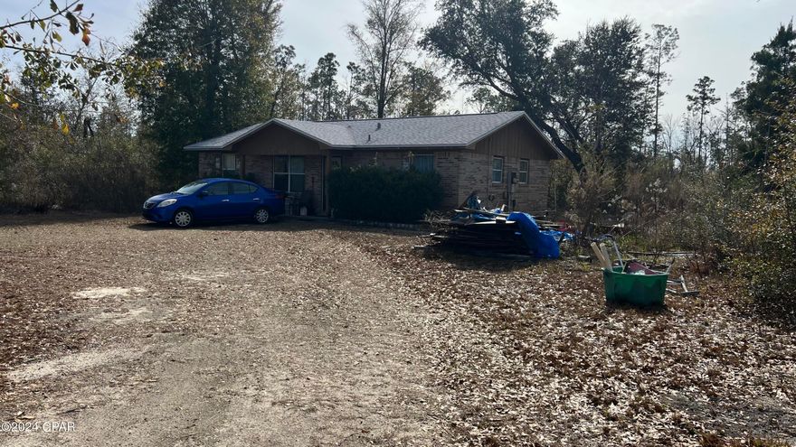 AS IS. This brick home is the perfect place for a first time home buyer and/or a small family. Quiet neighborhood and plenty of land to build a shop or a pool. Just clear some of the woods to the left of the house and you'll have plenty of space.