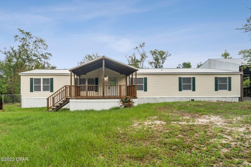 LARGE FAMILY HOME ON OVER 1 ACRE! Come see this 5 bedroom home in Bear Creek! Recently renovated with new appliances, fixtures, fans, and flooring throughout. Drywall, paint, countertops, and electrical outlets were updated as well. This property is on septic and has an artesian well, so not water bill or sewer bill! There is ample to live and entertain on an oversized covered front porch as well as room for parking under the 30x30 pole barn with concrete slab.  Bring your boats and recreational vehicles because theres even more room to store them under the 20x30 lean-to. Call a REALTOR today to schedule a private tour. If important, please verify all information and measurements.