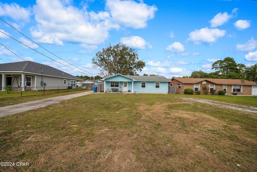 Very nice 3br/2ba cottage on a large lot and near the beach, It has a screened in porch and a yard building. This house is in a very quiet neighborhood on the west end of the beach.