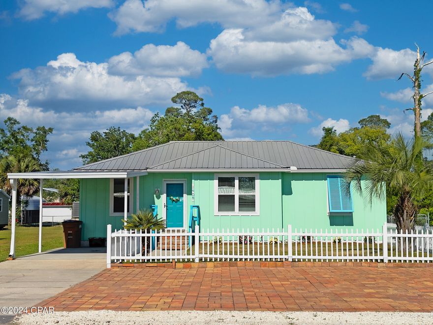 Welcome to your dream home just 3 blocks from St Joseph Bay! This beautiful 3 bedroom, 2 bath house is the perfect blend of charm and modern convenience that has been completely renovated down to studs and adorned with shiplap and is the epitome of coastal Florida cottage. With new plumbing, electric, siding, and windows, you can move in worry-free and start enjoying your new coastal lifestyle. The large yard is perfect for outdoor entertaining, and the driveway has plenty of room for boat parking. Plus, the fenced-in yard offers added privacy and security. You'll love being so close to downtown businesses and restaurants, making it easy to enjoy everything the area has to offer. Don't miss your chance to snag this property today!