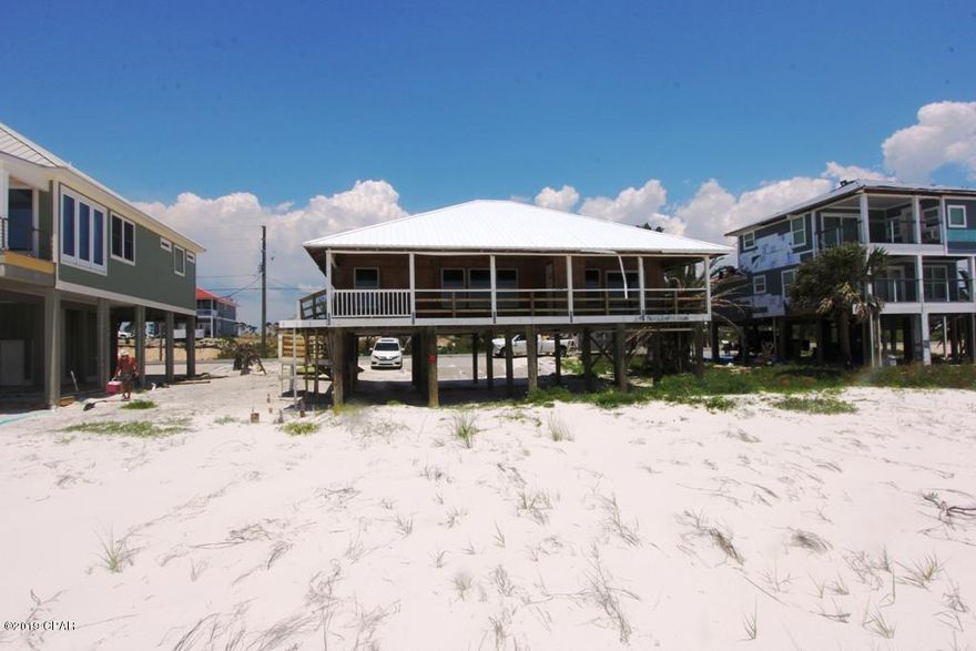 This is the first opportunity since Hurricane Michael to purchase a ''storm damaged'' beachfront home that appears salvageable & ready for a complete remodel. This home sits on a 75' wide lot in Beacon Hill, less than a mile from Mexico Beach & is being priced at the lot value only. The sellers are including the structure at no additional charge, the new buyer has the opportunity to fix this up how they want it & have equity day one. They also won't have to wait in the long lines to have a new house built that exists with DEP & the local builders. The soffits were blown out along with some other damage from the storm and the sellers have gutted this home completely, making it ready to remodel. Home has great potential with an open floorplan and large deck overlooking the beach.  Sold as is