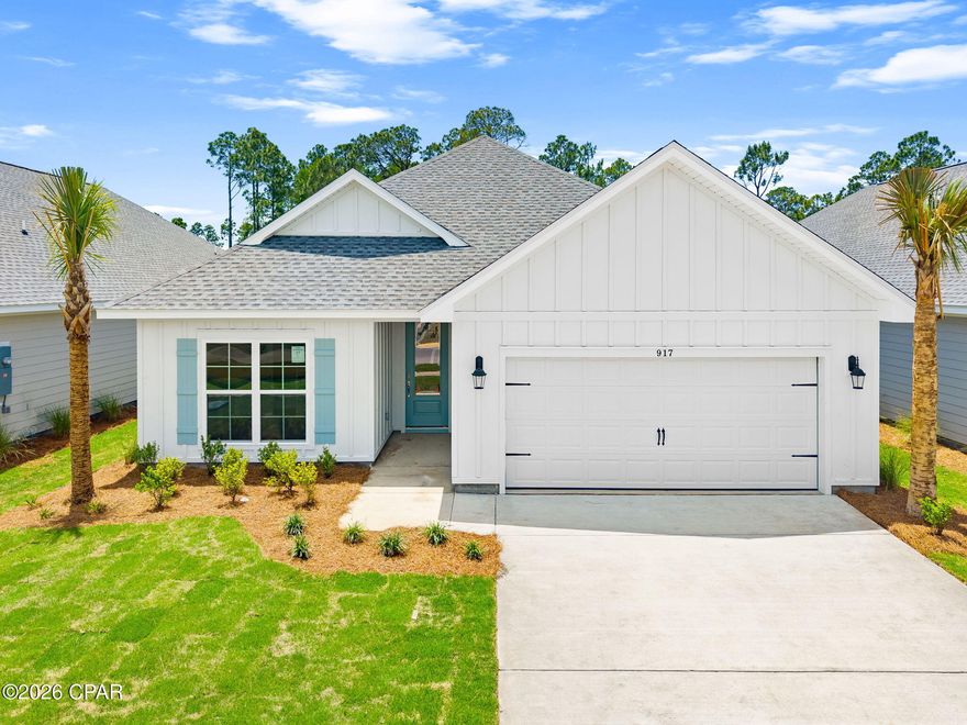 Welcome to 901 Crystal Bayou Boulevard, a new home at Breakfast Point East in Panama City Beach Florida. This home is ready for move in and features 2,300 square feet of naturally lit open living space and modern finishes. As you enter this home you will find a foyer with EVP flooring leading you past the first of three guest bedrooms and the guest bathroom. 

Continuing to the heart of the home, a large open concept living area awaits filled with natural light from the many windows and high ceilings. The kitchen has a center island and is open to the dining and living areas. Elegantly appointed, it is designed with quartz countertops, Herringbone tile backsplash, EVP flooring, and a single basin undermount sink in the island. Just off the kitchen, you'll find a secluded hall leading to the primary bedroom. An exceptional feature of this home includes a gas cooktop stove. 

Located in a private area of the home, this bedroom offers high ceilings and large windows. The luxurious primary bath is complete with an oversize tile shower, a dual sink vanity with quartz countertops, and a large walk-in closet with shelving. The laundry room is also conveniently located at the other end of the hallway. All three guest bedrooms can be found on the other side of the home along with the two full guest bathrooms. 

Beyond the interior features and details, every home is equipped with Smart Home Technology. This thoughtful integration of technology ensures that your new home is perfectly designed to meet the demands of modern life.