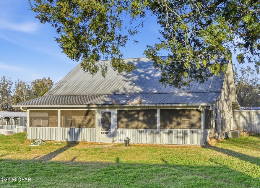 This brick property offers a 3 bedroom/2 bathroom main house with 2,050 sq ft and situated on a large, fenced in 2.59 acre lot. Interior updates include a new kitchen with approximately $20,000 in brand-new cabinetry and new tile flooring throughout the main house. Bedrooms are equipped with window-type A/C units, and the bathroom features a wooden under-sink cabinet with laminated countertops.

The home includes a large 2 car garage and an 18x36 in-ground pool. The property also features 3 additional structures, including an attached 800 sq ft mother-in-law suite, a detached 1 bedroom unit near the pool, and a detached 14x40 unit, offering strong rental.