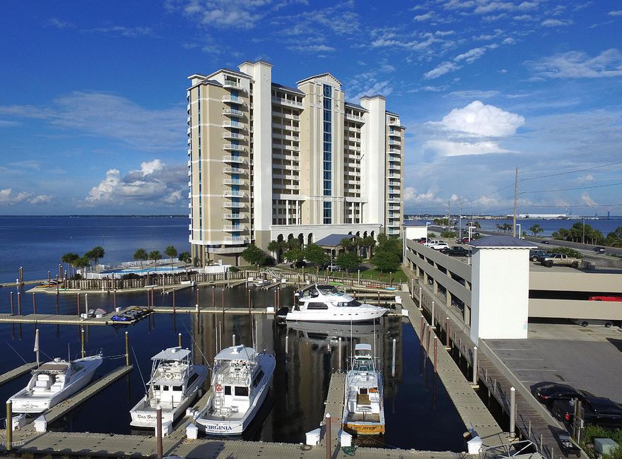 WELCOME HOME. Marina Landing is a premier bay-front residence.  No short-term rentals.  Live at the beach without having to fight the traffic.  These are some of the best views in all of Bay County.  All living areas and bedrooms are water-front.  447 s.f. balcony includes bar and grill.  Outside storage and covered parking.  Bay-front pool and hot-tub with entertainment areas, gym.  Paddle-board and kayakers' paradise.  Adjacent marina offers deep-water boat slips for sale or rent.  Local financing available.