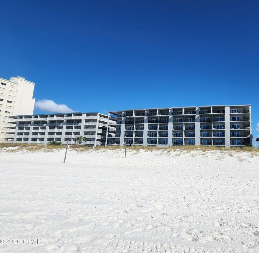 Mariner West Condominium complex is located on the quiet east end of Panama City Beach near St. Andrews State Park and the jetties. This 5th floor unit has been updated with wood grain style tile flooring, paint, lighting, brand new AC, and tasteful coastal decorations. With one large bedroom and two full baths, this condo is perfect for a small family or vacation rental. Building renovations are underway and the assessment will be paid by the seller before closing. This condo is located very close to Schooners, Patches Pub, Treasure Island Marina, Legendary Marine, Capt. Anderson's Restaurant and so much more! Age, sq ft,and dimensions approximate.