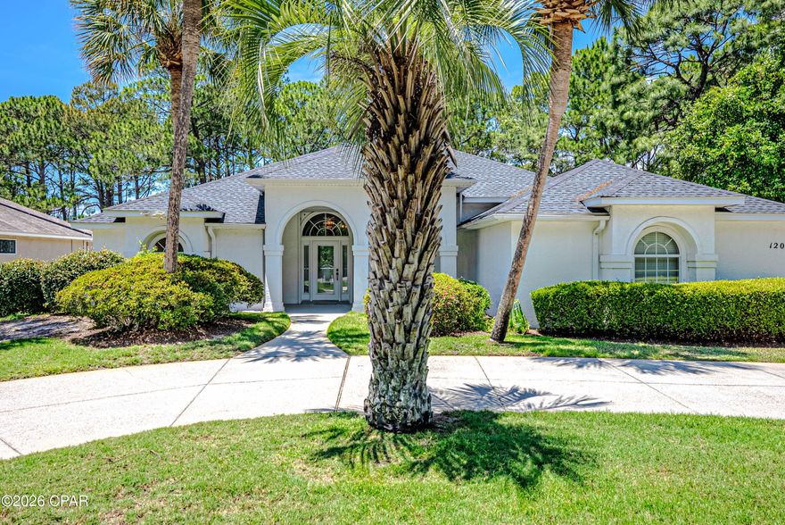 Welcome to 120 N Glades Trail located in one of the most sought after communities in PCB, The Glades. With this home's prime location, you are a golf cart ride away to Duplin Winery and a few short minutes to the white sandy beaches, shopping and great dining. 
This well maintained, one owner home features a split bedroom floor plan with 4 bedrooms, 2 1/2 baths, lush landsacping, tile flooring throughout, cathredal ceiling and custom built in cabinets in the living area, desingated dining space and a breakfast area.
The main suite is spacious with his and her closets and double doors leading to the patio area while the main bath offers seperate vanities, large walk in tile shower, soaking tub and a private water closet. 
The enlcosed, heated ingroud pool and spacious covered  patio area are sure to please year around for relaxing and entertaining. 
Feel safe and secure with automatic hurricane shutters that open and close with the push of a button. 
Some extra featutres include a beautiful arched entryway, circle drive for ample parking, 2 car garage, utililty sink in laundry room, pantry, crown molding, serene wooded areas surrounding the home and more. 
Don't miss out! Call today to schedule a showing.
