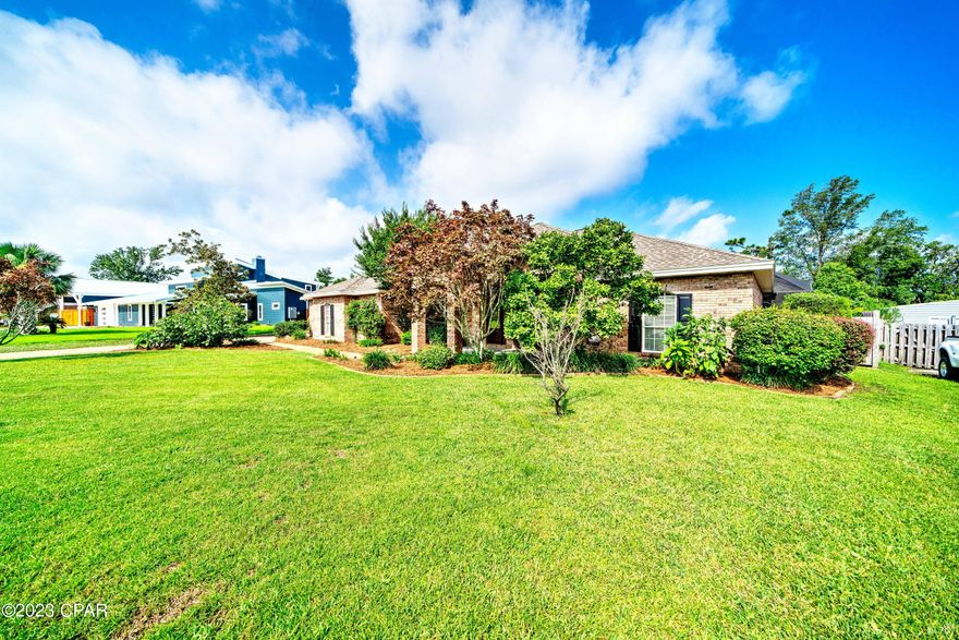 Waterfront with a Brand New Seawall in 2024! 2363 Foxworth Drive, a stunning WATERFRONT property located on the Robinson Bayou side of the prestigious Kings Point Subdivision. This house offers an array of desirable features that will captivate. 
As you approach the property, you are greeted by a charming front porch, perfect for relaxing and enjoying the beautiful surroundings. The house sits on over half an acre of land, providing ample space and privacy. Stepping inside, you'll immediately notice the gleaming hardwood floors that flow throughout the house. The interior has been recently painted, giving it a fresh and inviting feel.
The heart of the home is the open concept family room, kitchen, and dining area. With 12-foot ceilings, this space feels grand and spacious, ideal for entertaining or quality time with loved ones. The kitchen boasts modern appliances, plenty of counter space, and an abundance of storage, perfect for all the chefs. The enormous primary suite is a true retreat. It features his and her closets, providing ample space for all your belongings. The en-suite bathroom offers a separate tub and a walk-in shower, as well as a double vanity, adding a touch of luxury to your daily routine. Additionally, there is a pool bath conveniently located for easy access from the outdoor area. Speaking of the outdoors, this property truly embraces the waterfront lifestyle. The screened-in pool and back patio area provide the perfect setting for relaxation and outdoor gatherings. You can also take advantage of the fenced-in backyard, offering a safe space for children and pets to play.
For boat enthusiasts, the property includes a boat house with a 10,000 lb lift, allowing you to effortlessly access the water from your backyard. Imagine taking your boat to dinner, exploring nearby Shell Island, fishing, or even commuting to work by boat.
In addition to the boat house, there is a workshop with a garage and a covered patio, providing a versatile space for hobbies, storage, or even a home office or home school. 
The property also features an oversized two-car garage, ensuring plenty of room for parking and additional storage.
Located in the center of Panama City, Kings Point offers easy access to shops, restaurants, grocery stores, and all the conveniences you desire. This property is situated on one of the best streets, characterized by beautifully landscaped yards and a tranquil atmosphere.
In summary, 2363 Foxworth Drive is a remarkable waterfront home that has it all. From its prime location and abundance of amenities to its spacious layout and captivating views, this property is truly a dream come true. Don't miss the opportunity to make it your own. Come visit today!