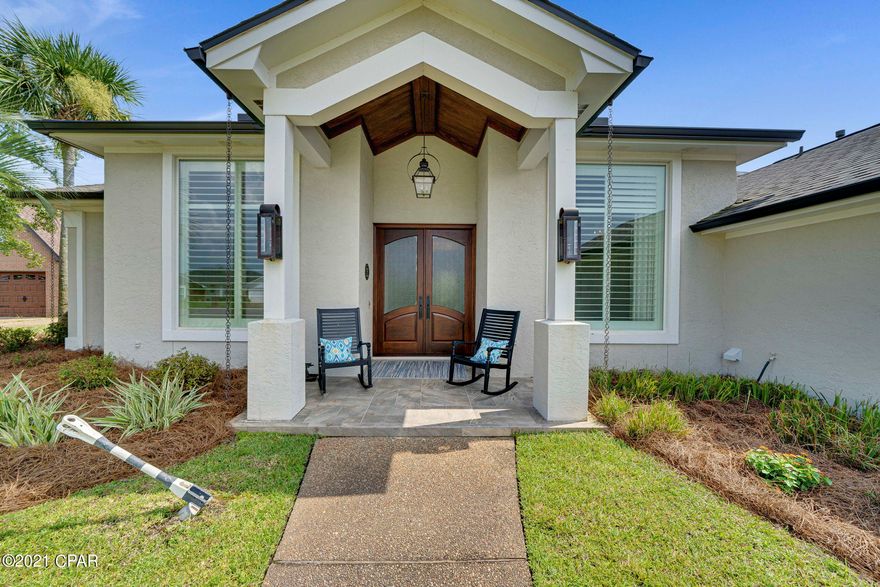 This home looks like something out of a magazine. Beautifully remodeled Florida style home with Phantom split sliding screen back porch, pool with cool deck and saltwater treatment, golf cart garage/ pool house with outside shower, beautiful stone fire pit with gas starter, privacy fence. The 8-foot custom wood front doors by EF Saun set the tone for this entry along with natural gas lanterns greeting you. Custom kitchen with sub-zero refrigeration, microwave drawer, Betrzoni gas range, custom stainless sink with Waterworks articulating faucet, and instant hot water dispenser. Beautiful quartz countertops to include a jumbo slab island. The laundry room/butler pantry features double ovens, dishwasher, sink with a disposer, French door refrigerator, and custom cabinets. Huge master bedroom with private entry to the pool. Very large master bath suite with travertine floors and shower, rain shower, huge soaking tub, and 3 walk-in closets. Open concept custom kitchen and family room with gas remote start fireplace, custom built-in cabinets, and 10 ft, custom barn doors. Wide plank warm hardwood floors throughout living areas with carpeted bedrooms. Two connecting bedrooms with Jack-n-Jill bathroom, guest room with huge closet and bath that also connects to the outside porch for easy access when coming out of the pool. In-home office with French doors and built-in shelves and 10-foot walk-in storage closet. The elegant formal dining area as well as a breakfast dining area flows onto the pool area. Custom window treatments throughout, new tankless hot water heater, decked attic space, sprinkler system, whole house built-in generator, and wonderful family neighborhood all add to the value of this special home.