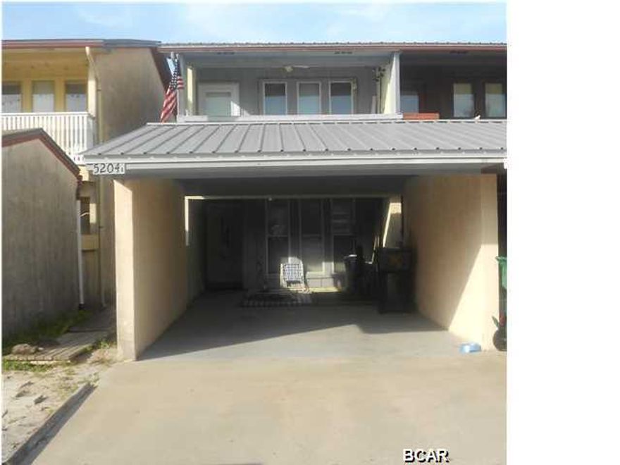 GULF VIEW TOWNHOME ACROSS FROM SCOONERS AND THE GULF BEACH ACCESS, W/COVERED CARPORT, THIS IS AN END UNIT, NEW METAL ROOF, TWO BEDROOMS ON MAIN LEVEL, BIG LIVING ROOM / DINING /KICHEN AND BATH UPSTAIRS LARGE COVERED PORCH OFF LIVING ROOM WITH VIEW OF GULF ACROSS STREET. NO HOA FEES! UPDATED HVAC, BEACH ACCESS DIRECTLY ACROSS STREET. WALK TO SHOPPING, SCAMPI'S AND SCOONERS. LOCATED ON THE QUIET END OF THE BEACH BETWEEN THOMAS DR AND THE GULF. NO ELEVATORS HERE JUST DRIVE RIGHT UP TO YOUR FRONT DOOR. IF YOU ARE A CONDO OWNER AND TIRED OF THE PARKING, EXPENSIVE FEES, CROWDS ETC THIS IS A GREAT ALTERNATIVE. ONE OWNER FAMILY NEVER BEEN ON A RENTAL PROGRAM.