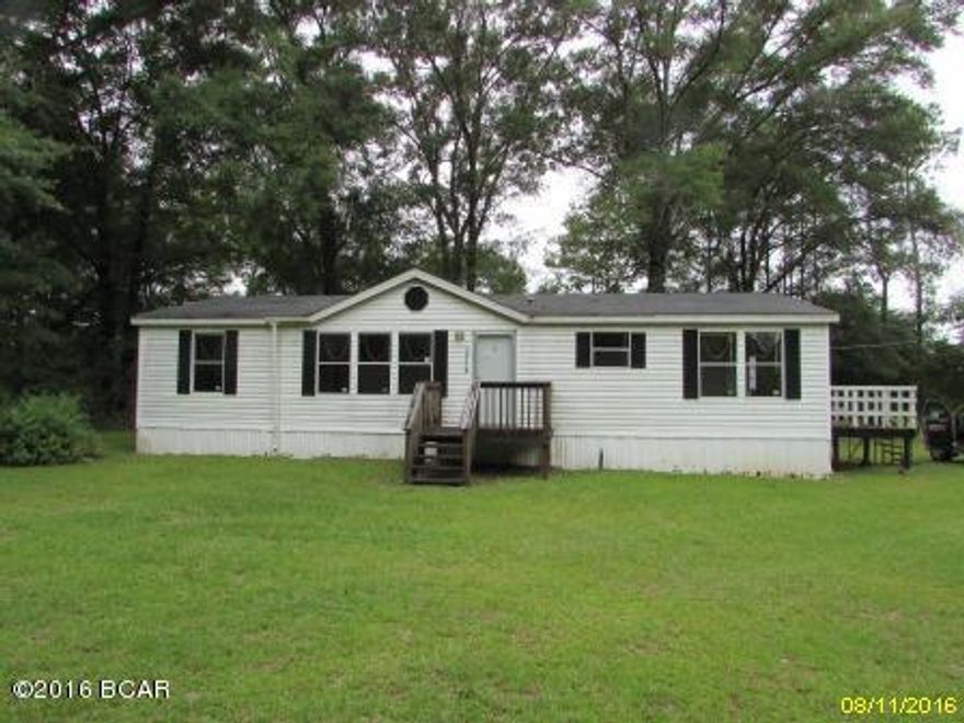 Nice 3 Bedroom 2 Bath DWMH in Altha just off Hwy 73. MOVE RIGHT IN….. 2 Decks, storage building on 1/2 acre. Large open kitchen with breakfast bar. Master bath has double sinks, garden tub, shower stall. Wont last long!!