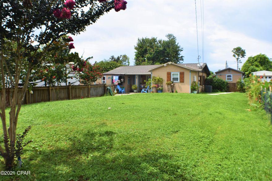 CURRENTLY UNDER CONTRACT, SELLER ACCEPTING BACKUP OFFERS  Fantastic St Andrews area home with a 2BR/2BR 1,128 sqft home and a separate 1BR/1BA 355 sqft apartment!   Recent updates including vinyl plank flooring, new kitchen countertops, all new master bath, light fixtures, new roof in 2019, AC and duct work, wiring and plumbing updated including two tankless water heaters. Some of the extras include beadboard accents, wainscoting, shiplap walls, tile backsplash, barn doors that cover the laundry room and so much more. The landscaping is gorgeous and you'll enjoy having a covered deck for grilling out and entertaining in the privacy fenced backyard. The apartment not only includes a full kitchen and bath, but its own laundry hook-ups too!  Lots of investment potential All info is approx and must be verified by Buyers if important.  Current lease in the apartment is $800 and month-to-month