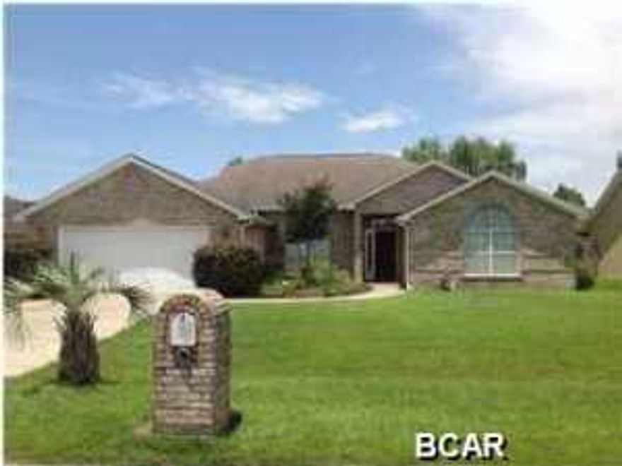 Hidden Pines 4 bedroom home in great condition! This home also has two full baths, and a wonderful great room with beamed cathedral ceilings, plus nice crown molding and gas fireplace and custom tile flooring. There is also floating laminate wood floors throughout the rest of the home. Split bedroom plan, formal dining room and large kitchen with plenty of cabinets and a breakfast nook. There is also a fully enclosed Florida room that is heated/cooled. Master suite is spacious and master bath has big walk in closet, double vanities, separate shower and whirlpool tub. Roomy laundry room with extra cabinets for storage. Backyard is privacy fenced, has big patio for relaxing. Yard is nicely landscaped and has sprinkler system on separate meter. Gas water heater, fireplace and hookup