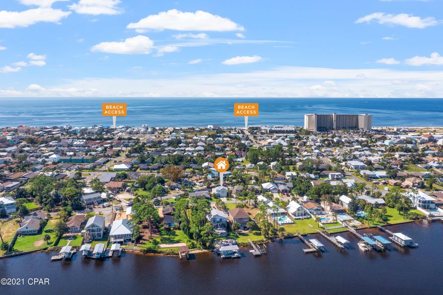 Short-term rentals allowed! Would make an awesome Air B&B or amazing primary home. This one-of-a-kind home has it all!

Beach access #11 is only few blocks away.

Exquisite, energy-efficient 4 bedrooms / 2.5 bathroom home with contemporary open floor plan concept. The upstairs balcony features a view of the lagoon.  Shaker-style soft close cabinets, tiled backsplash. The Master bath features a double vanity, contemporary shower featuring marble look tile. The 2 additional bedrooms share a full bathroom. Yamaha Natural Sound AV Receiver with 5 channel Sony speakers,

Network Video Recorder with 2 security cameras, which records and stores files. Samsung stainless steel appliances and washer/dryer.
