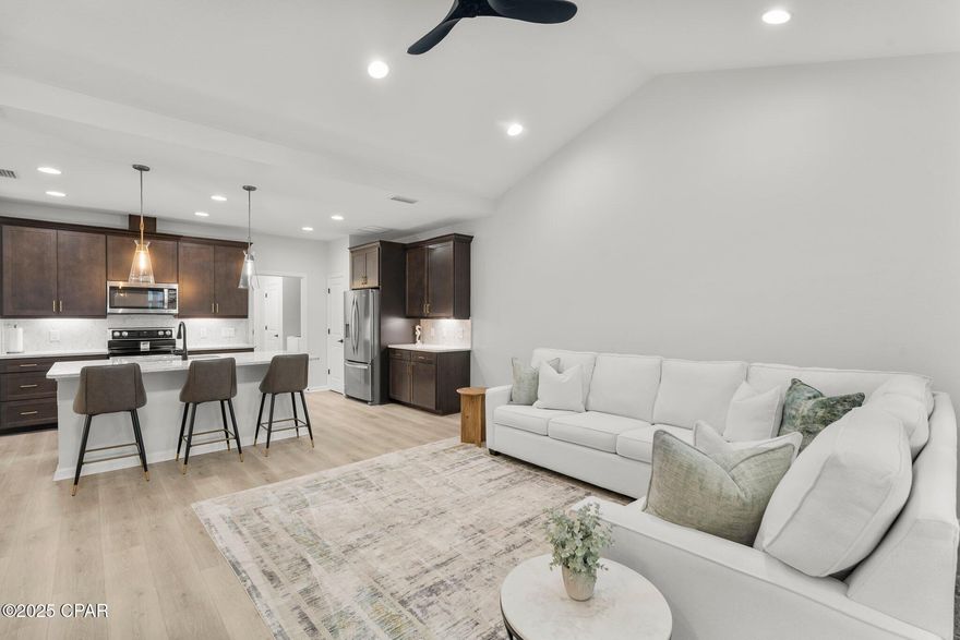 SELLER MOTIVATED AND WILL CONSIDER ALL OFFERS!!
**Welcome to Your Slice of Paradise at this beautiful Camellia Cottage!** 🌴  
Nestled in the lively 55+ community of Latitude Margaritaville Watersound, this charming abode offers the ultimate laid-back lifestyle inspired by the spirit of Jimmy Buffett. 

Step inside to discover a beautifully painted haven, adorned with earthy wood cabinets and stunning Quartz countertops that make cooking a pleasure. Enjoy the ease of laminate and tile flooring throughout, ensuring your home is as carefree as your days spent soaking up the sun. 

Relax on your screened-in porch, enhanced with sleek epoxy flooring—a perfect spot for morning coffee or sunset cocktails. With all appliances included and custom mirrors, lighting, and window treatments throughout, this gem is ready for you to move right in!

Experience the vibrant camaraderie of a resort-style neighborhood where every day feels like a vacation. Don't miss out on this opportunity to embrace coastal living at its finest—your dream home awaits at Camellia Cottage! 🏖️✨

Enjoy the transferrable 2-10 builders warranty for peace of mind. Latitude Margaritaville is the most sought after 55+ community in the country right now with unmatched amenities including a private restaurant with 3 bars, resort pool, live music daily, pickleball, bocce ball, cornhole, putting green, Fins Up Fitness Center, indoor lap pool & whirlpool and a full lifestyle staff who dedicate their days to ensuring your fun! Phase 2 of the amenities include a full size theatre featuring comedy shows and tribute bands, Barkaritaville dog spa, woodworking shop, pottery room, business center and community rooms for clubs, groups, tastings and food demonstrations. The public retail has also begun with the golf cart store, Capital City Bank and we are anticipating the grocery store, restaurants and other boutique shopping soon as well as Public Marina...all through St Joe! Whether you're looking to embrace a vibrant community or simply enjoy the laid-back beach lifestyle, this home has it all. Don't miss your chance to experience the ultimate in comfort and stylecome see it for yourself!