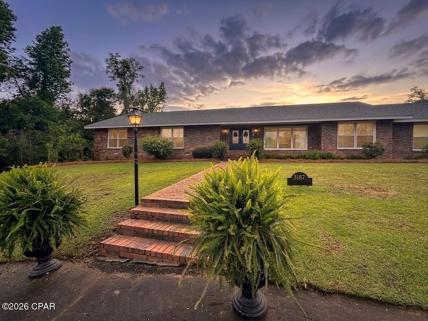 Welcome to your private oasis in the heart of town--this beautifully updated 4-bedroom, 3.5-bath home offers space, charm, and incredible versatility on a meticulously maintained 1.34-acre lot. With lush landscaping that bursts to life in every season--magnolias, bridal wreath, hydrangeas, ferns, and Peggy Martin roses all blooming in harmony--this property delivers a setting that photos simply can't capture.

A circular drive provides a warm and inviting arrival, setting the tone for what awaits inside. Step through the front door and instantly feel at home in the spacious living room, where warm wood flooring and a striking fireplace create the perfect gathering space. The adjacent eat-in chef's kitchen features a beautiful antique island, ideal for both everyday living and entertaining, with a formal dining room ready for hosting special occasions.

One of the home's most flexible and exciting features is the bonus flex room--complete with its own walk-in closet, half bath, and access to a dedicated ''Christmas Closet.'' Whether you envision a 5th bedroom, home gym, playroom, or homeschool space, this area adapts to your needs with ease.

Outdoor living is just as impressive, with a massive screened porch that offers endless possibilities, including a water hookup for a future outdoor kitchen. A charming courtyard enhances the sense of privacy, framed by meticulously trimmed and blooming ligustrum for a serene, scenic escape.

Storage is truly unmatched throughout the home, highlighted by the primary suite, which includes not one but two walk-in closets plus a dedicated bill-pay or sewing nook--an unexpected and thoughtful touch.

This home is more than just a place to live--it's a lifestyle defined by comfort, beauty, and room to grow.