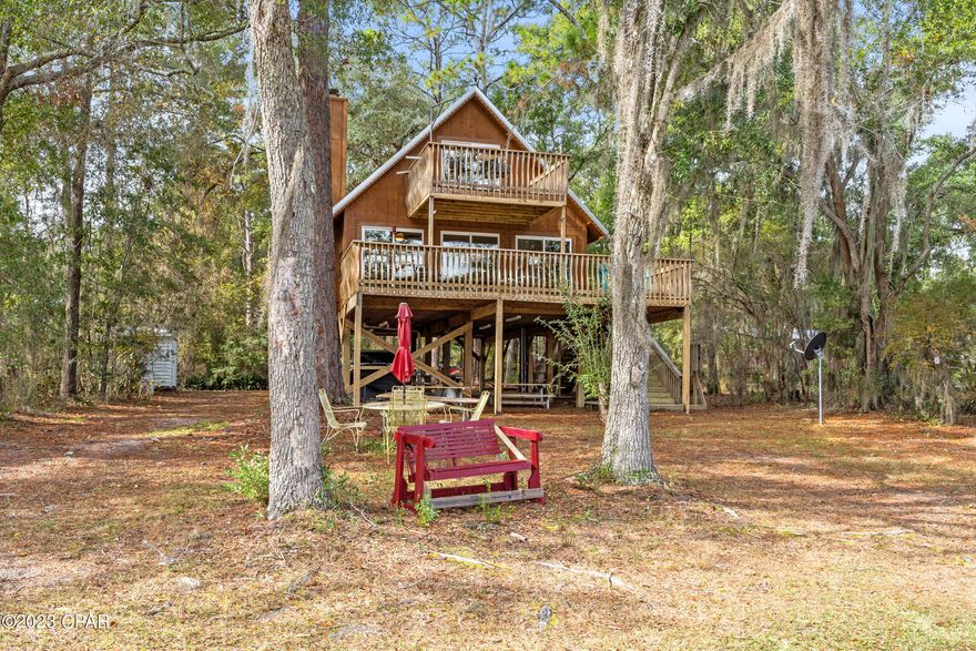 Welcome to 4081 Stillwater Drive, a charming waterfront haven that seamlessly blends comfort and style. This thoughtfully designed residence features 3 bedrooms and 2 bathrooms, with the unique option to customize the third bedroom, currently converted into a spacious closet. The open-concept living area creates a warm and inviting atmosphere, ideal for both relaxation and entertaining. Enjoy picturesque views of the water from the comfort of your home, and step outside onto expansive decks to further immerse yourself in the serene waterfront setting. A long dock extends into the water, providing a perfect spot to soak in the tranquility or launch water activities. With the flexibility to reimagine spaces according to your preferences, this home offers a versatile canvas for your dream coastal lifestyle. Don't miss the opportunity to make 4081 Stillwater Drive your retreat where everyday living feels like a waterfront escape.