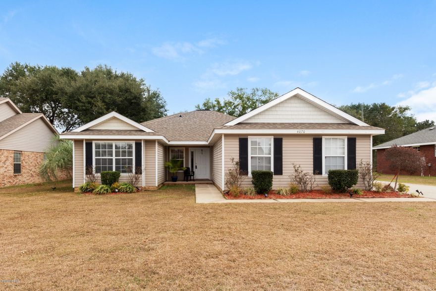 This stunning four-bedroom, two bath home located in the highly desirable Pace School District sits on a ¼ acre lot with awesome views and no neighbors behind. The property has been well maintained and is move in ready! Upon entry, you are greeted by an inviting foyer that leads to the bright, open great room with high ceilings and captivating windows that showcase the beautiful outdoor view. To the left of the foyer is a hallway leading to two large bedrooms and a full-size bathroom. To the right is the inviting master bedroom featuring high ceilings, sitting area, large master-bath with double vanity, soaking tub, and separate shower. The fourth bedroom and laundry room are also located on this side of the home. You'll love the bright and open eat-in kitchen, and enjoy afternoons on... your covered patio with wall mounted tv, private back yard with beautiful landscaping and mature trees that surround the property. The home also features Hurricane protection window panels, monitored surveillance cameras at entry points, a side entry garage with utility sink, and lots of room to park. This is a must see! Call today! Buyer is responsible for verifying information, dimensions, and measurements deemed important.