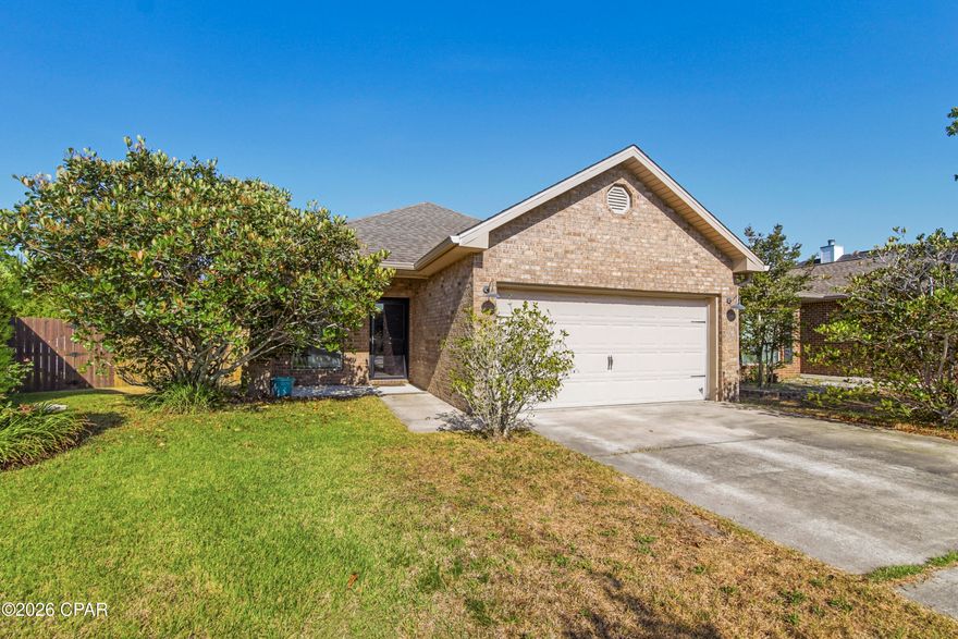 Move-In Ready Beauty In An Amazing Location--Don't Miss This One! This immaculate, beautifully maintained 3-bedroom, 2-bath brick home is tucked away on a quiet cul-de-sac in the desirable Plantation Park neighborhood. Situated on one of the larger lots in the community, this home features a classic Craftsman-style exterior with solid brick construction, gutters, and lush landscaping that creates privacy and inviting curb appeal. Inside, you'll find a bright and open kitchen and living area, perfect for everyday living and entertaining. Tile flooring throughout the main living spaces ensures durability and easy maintenance, while tray ceilings with crown molding add an elegant touch. Natural light fills the home, creating a warm and welcoming atmosphere. The kitchen is thoughtfully designed with granite countertops, stainless steel appliances, shaker-style cabinetry, a decorative backsplash, large pantry, plus a convenient breakfast bar for enjoying your casual meals. The dedicated dining room features an updated chandelier and an additional storage closet with custom shelving--perfect for staying organized. The luxe primary suite includes tray ceilings, a large walk-in closet, and a private en-suite bath with double vanities, a deep soaking tub, and a separate shower. Two additional bedrooms with upgraded carpet and a full hall bath provide comfortable space for family or guests. The outdoor living areas add even more usable space and are just as impressive! Step outside to enjoy beautiful sunset views from the extended back deck, complete with added seating and built-in storage. A screened-in porch offers the perfect spot to unwind during the evenings or enjoy outdoor living year-round. Additional features include a large privacy-fenced yard,  an attached 2-car garage, a laundry room w/ cabinets, a covered front porch, and a convenient location with easy access to shopping, restaurants, area hospitals, and Tyndall AFB. This home combines thoughtful updates, functional design, and a quiet neighborhood setting, making it an appealing choice for anyone looking to settle in Panama City. Call today for more information or to schedule your private tour!