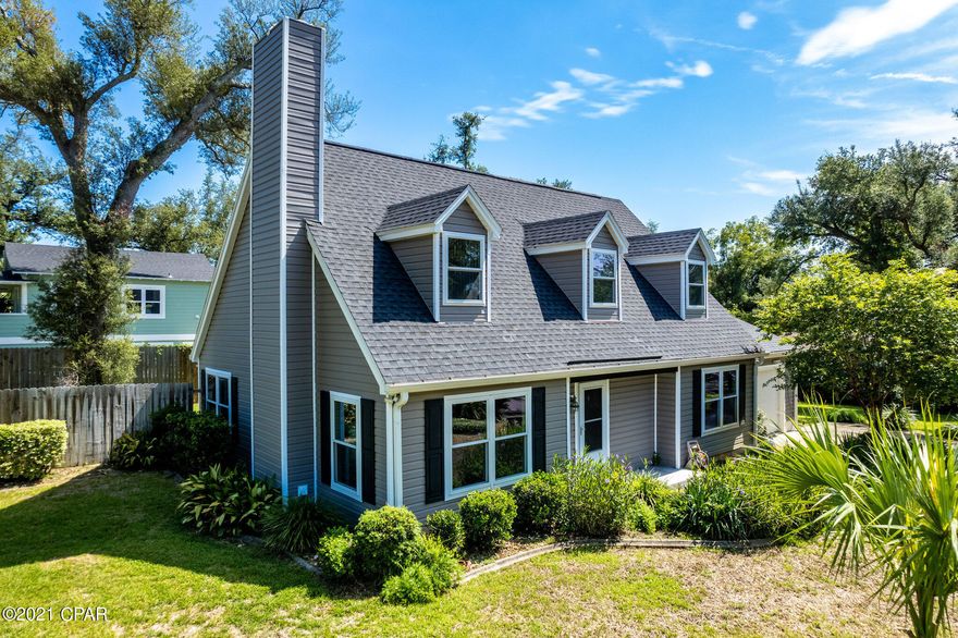 'CURRENTLY UNDER CONTRACT, SELLER ACCEPTING BACKUP OFFERS' This clean, spacious 3 BR 2 B Cove home on a corner lot is just waiting for the right person to make it their home.  Wood floors, tile in the wet areas and lots of storage make this an ideal home for a move up or retirement location.  Within walking distance of the water, and biking distance of downtown shops and restaurants and a quick drive to a state of the art hospital this makes it the perfect centrally located home.