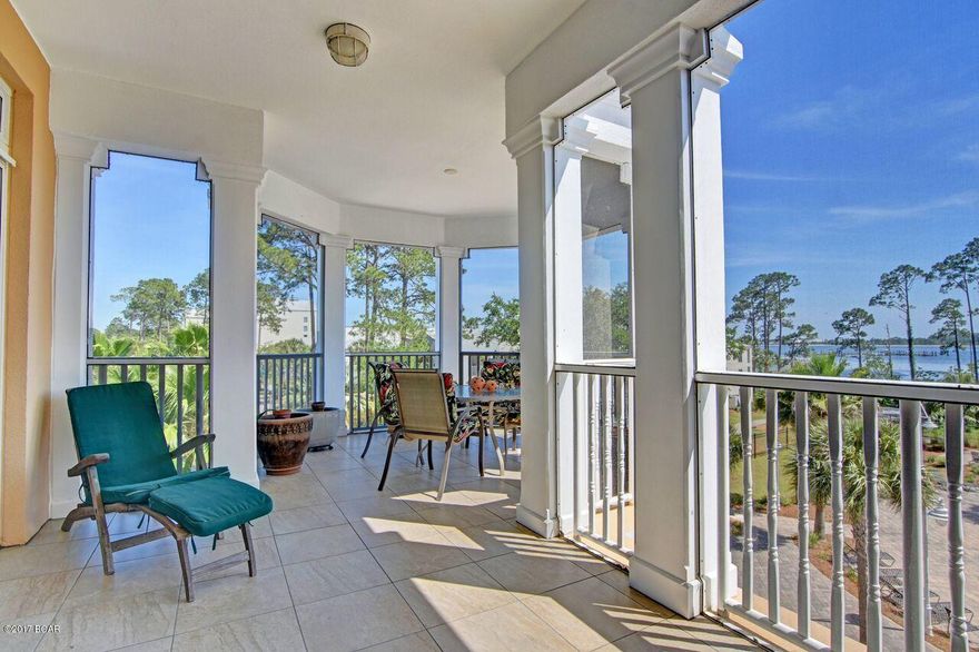 Who has heard of having the luxury of a 4 BEDROOM, 4.5 BATH condo at Bay Point's REFLECTIONS with positive equity at the closing table?? Sellers spent big money and many hours designing the renovation that added more value than the asking price. You cannot help but fall in love with the wide-open concept this corner unit has. It offers views of the golf course, St Andrews Bay, and the gorgeous Reflections pool! Enjoy dining on your 336 square foot screened-in ''gazebo'' porch after cooking in the fabulous kitchen. Truly a work of art, you must see the countless upgrades in the kitchen alone! The showers in all 4 baths were upgraded along with most of the cabinetry. All flooring is exceptional! Reflections is on the VA approved list, so start packing.