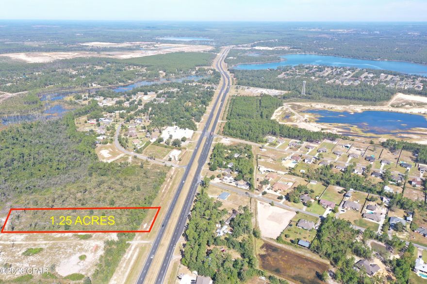 Great High and Dry Commercial Parcel on Hwy 77. C-3 General Commercial Zoning. Water and Sewer. This parcel sits at the corner to the entrance of the New Osprey Point Neighborhood.