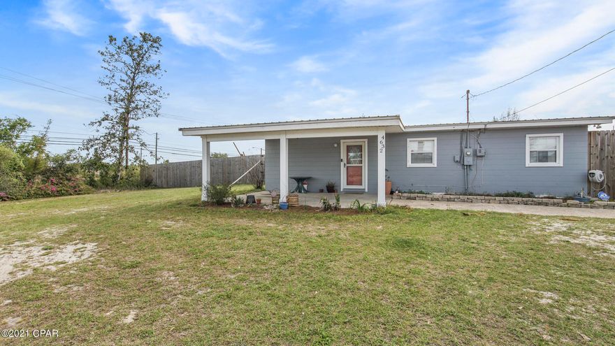 **CURRENTLY UNDER CONTRACT, SELLER ACCEPTING BACKUP OFFERS ** Looking for a larger lot but close to town?  Check out this 3 bdrm 2 bath block home with a separate 1 room 1 bath efficiency apartment and located on over an acre in Panama City!  Convenient to schools, shopping, and town. Stainless steel appliances, granite counter tops, & reverse osmosis water softener by Culligan (lease).  Bonus room could be used as another bedroom, huge walk in closet, or a home office.  Mother in-law suite is equipped with a kitchen with gas stove (propane tank), full bath, washer/dryer hookup, and central heat/air on a mini-split. Plenty of room to park your toys or equipment with over an acre of land in town. Swing set, coop, pole barn & shed all convey!   Mother-in-law building included in square foota could also be used as a separate office, craft room, guests area, etc.  Updates include paint, flooring, new living room windows, and a new roof on the apartment.  If measurements deemed important, please verify.