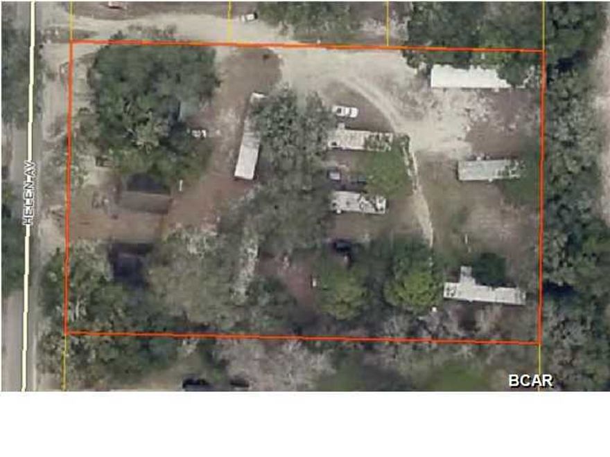 3 HOUSES + 7 MOBILE HOMES + 1.5 ACRES. House Number 744: 3 Bedrooms/1 Bath, House Number 740: 2 Bedrooms/1 Bath, House Number 738: 1 Bedroom/1 Bath. All mobile homes are single wide. The 8th single wide on property is not included. Great rental income. Located within walking distance to schools. Call today for more information.