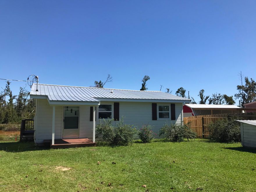 Currently under contract.  Seller is taking back-up offers. Come see a FISHERMAN'S PARADISE  or LADIES  DOLLHOUSE.  Adorable 3 Bedroom with 1 & 1/2 Bath home located on the water directly accessible to Chattahoochee River & the Home of Big Bass Fishing on Lake Seminole. Maneuver your boat out to the Chattahoochee River & into Lake Seminole from your backyard. Nestled in an area with quick access to Georgia & Alabama.  Home is completely remodeled with new roof, paint, flooring,  windows, & new stove. Bonus room on back has laundry hookups or used as bedroom or office. Newly built 2 slip boat shed & 16 x 16 Storage Building. Seller is also repairing the Fish Cook House in the back yard.  Live in this full time or have a wonderful weekend getaway for yourself, family, & friends. Room & lot sizes are approximate