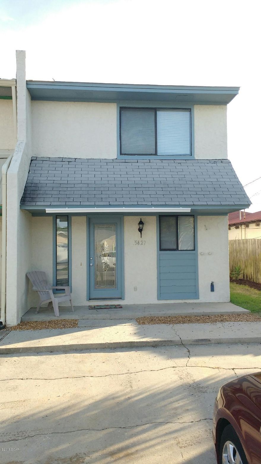 Charming 2 bedroom, 1.5 bathroom end unit townhome located in a perfect location just 3 blocks from 2 beach accesses, close to Schooners, Grand Lagoon, and just a short distance to the Navy Base.  Both bedrooms are located upstairs and share a full bathroom.  There is a half bath on the main floor.  One bedroom faces the gulf, has its own balcony overlooking the privacy fenced backyard, and a 13' long double closet.  Because this is an end unit with side yard, owner has outside access to the backyard.  There is also an outdoor shower that allows for one to rinse off ''the beach'' before entering the home.  Home features inside laundry room, sunroom, nearly new HVAC inside & out, freshly painted interior and outside trim, updated toilets, panel doors, and lighting fixtures/fans.  Storage shed in backyard.  Dedicated driveway accommodates four normal sized cars.  No HOA fees.  This attractive home is a steal at this price!  Info is reliable but not guaranteed.