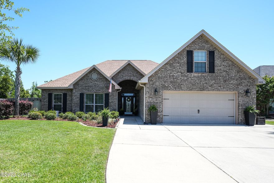 CURRENTLY UNDER CONTRACT, SELLER WILL CONSIDER BACKUP OFFERS Welcome to your dream home at 5012 Pretty Way! This stunning property boasts a spacious and well-designed floor plan that is perfect for comfortable living and entertaining. With 4 bedrooms (PLUS A BONUS room above the garage that can be the 5th bedroom), 2.5 bathrooms, and a 2-car garage, this home offers plenty of room for your family and guests.

As you step inside, you'll be greeted by a bright and inviting living room that flows seamlessly into the dining area and kitchen. The kitchen is equipped with modern appliances, 2 refrigerators, ample counter space, and a breakfast bar making it easy to prepare and serve meals PLUS a large pantry for more storage.  The living room has hardwood floors and a tray ceiling with crown molding.  A half bath is just off of the living room and formal dining room.

The primary bedroom is a serene retreat with an en-suite bathroom featuring a double vanity, a soaking tub, and a separate shower. and a walk in closet. The other three bedrooms are also generously sized and share a full bathroom.  Through out the bedrooms as well as the rest of the home all of the shelving is custom built and very sturdy, not like the traditional wire shelving.  One of the bedrooms is cleverly being used as a HUGE walk in closet and can easily be converted back to a master bedroom.

Enjoy outdoor living in the privacy of your fenced backyard, complete with an open patio and lush landscaping and thick green grass. This home also comes with an 8' privacy fence for added privacy.  The home features great landscaping and concrete walkways that go completely around the home as well as an extra wide driveway for more parking.

Located in a desirable neighborhood in Panama City, FL, this home is just minutes away from shopping, dining, entertainment, and schools. Don't miss the opportunity to make this your forever home – schedule your showing today!