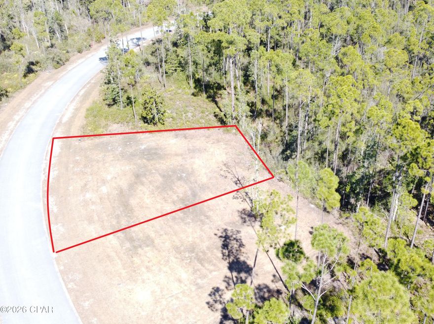 A Beautiful home site in the desirable Laird Point. Situated on the west side of the peninsula, so you will enjoy the wonderful breezes off of East Bay. Lot is already cleared and de-rooted, saving the new owner time and money. Water, sewer, and electric are ready to connect. The lot next to this one is also available (921 Watermark Way) Perfect for someone who wants to build a large home on two lots, have family build next door, or just hold it for the future. Great proximity to the tennis courts and new pickleball courts. Laird Point is a gated, waterfront community. It features underground city utilities and ribbon curbed streets. Amenities also include RV/Boat storage. Beautiful custom homes throughout. Schedule your visit today!