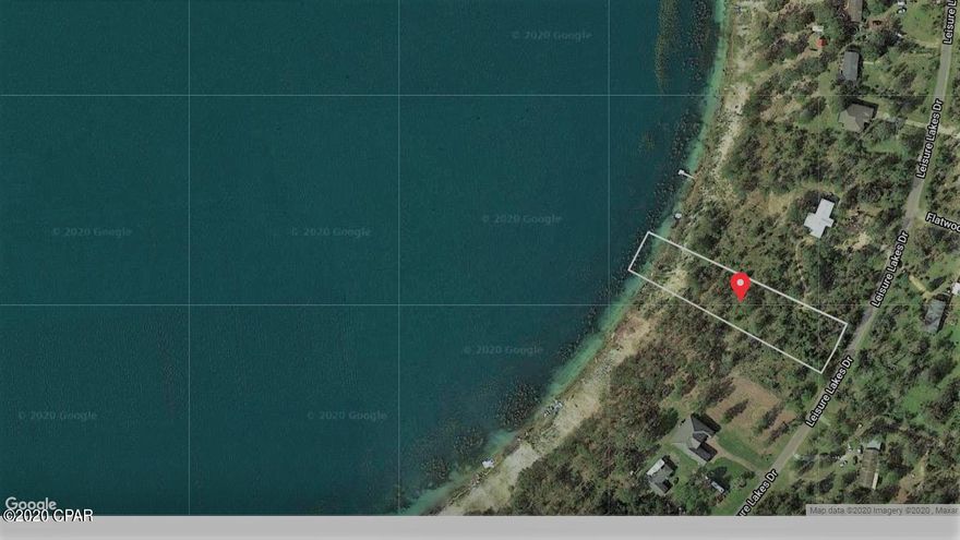 Lakefront 1 acer lot on a Crystal-clear spring fed 160 acer lake.  Great homesite! Maned gated entry. Community pool, clubhouse, boat ramp, tennis court and basketball court. Great for fishing! Paved roads all the way to HWY 77 and Interstate 10. Only 20 minutes to Northwest Florida Beaches International Airport (ECP). 40 Minutes to Panama City Beach! Owner will discount this Lake front lot  if purchased together with lots b46( and b44. Don't miss out on this great opportunity! Seller says bring an offer!