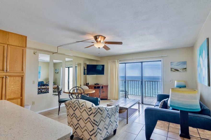 Upgraded Unit, being sold fully furnished, on a perfect rental floor ''10th'' at the Summit Resort, and priced to sell! This unit has gone through some upgrades over the last few years to include an upgraded kitchen with newer cabinets, counters, and backsplash. The living room and master bath have modern and updated tile, making this unit tile throughout for easy maintenance.  Some of the furnishings are newer and this well designed and tastefully decorated unit can comfortably sleep 6 with the pull-out sofa bed, and bunks in the hall.  Another great feature of this unit, that many units do not have, is the washer & dryer, allowing you to do laundry at your convenience.  See the video under ''photos'' for additional walk through coverage of this unobstructed Gulf Front **ENTER ON MORE** condo.  The Summit has more amenities than many condo complexes on the beach to include: Gated 24-Hour Security, Two Oversized Pools, 2 Designated Children's Pools, 2 Whirlpools, Large Pool Area with Grassy Sitting Area, Large Indoor Hot Tub, His & Her Sauna Steam Rooms, Lighted Tennis Courts, Shuffle Board Court, Poolside Tiki-Bar, Arcade Game Room, Owners Lounge, Beachside Gated Playground, Summit Market Convenience Store, Bikini-Bobs Restaurant, Charcoal BBQ Grills, Beach Volleyball, Onsite Laundry Facility, and Beach Services is available for all your favorite Water Sports and Beach Chair Rentals. This resort is within walking distance to some of the best restaurants, clubs, and area attractions which makes it one of Panama City Beaches prime rental condos. If that's not enough, the association dues are some of the lowest around at $1314 p/qtr. and even include cable and internet. Call today for your private showing before it's gone! Age, Sq. Ft., Taxes, Room Dimensions, are all an estimate and if important by the buyer must be verified via inspection or appraisal.