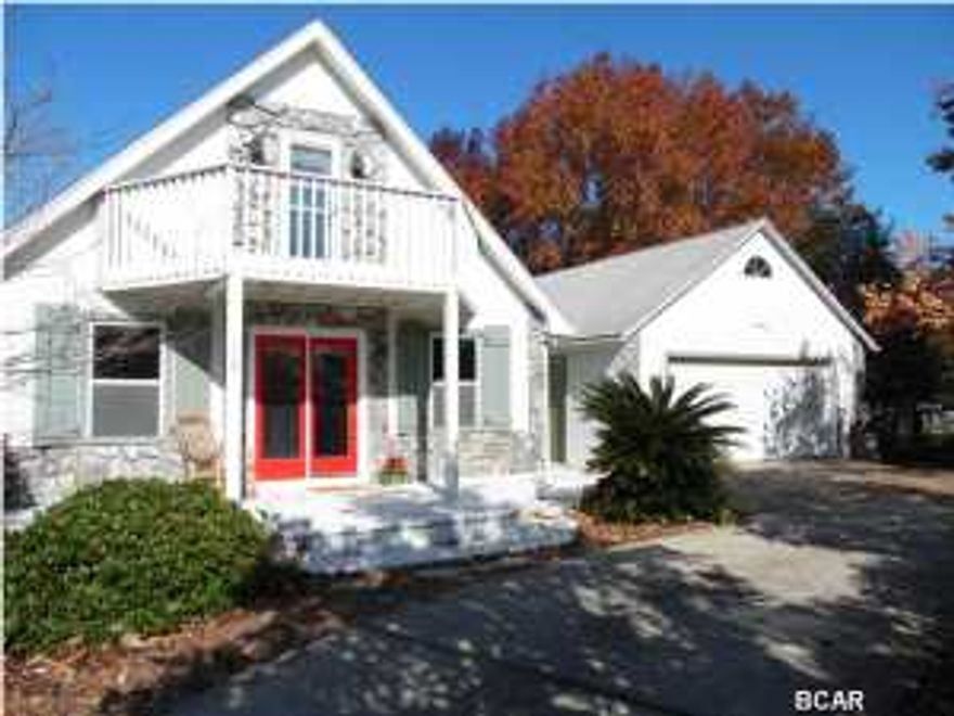 This 3 bedroom 2 bath home has a great deal of charm. There is hardwood flooring throughout most of the home, custom tile work in the Florida room and bath. Downstairs there are two bedrooms and a Florida room. The Florida room has an awesome tile design and two doors leading to outside deck. The upstairs loft area boast of a Master Suite with office and its own private deck. There is a detached oversized, double car garage and a beautifully totally fenced back yard, with many mature hardwood trees. The location of this property is a stones throw to Pier Park, a short distance to the beach, and only 10min to the airport. It would make a terrific rental or primary home.