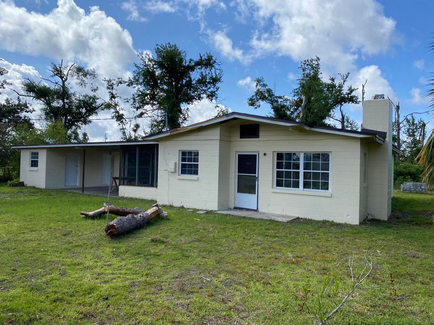 CURRENTLY UNDER CONTRACT, SELLER ACCEPTING BACKUP OFFERS.  House and property with lots of potential. Large, 7/10 of acre lot with house, double carport and large storage area. While much of the Hurricane Michael storm damage has been repaired, there is still some work to be done - mostly interior finish work. Great location, convenient to Tyndall AFB and downtown. Terrific potential for the investor or flipper. Thanks for considering this property!