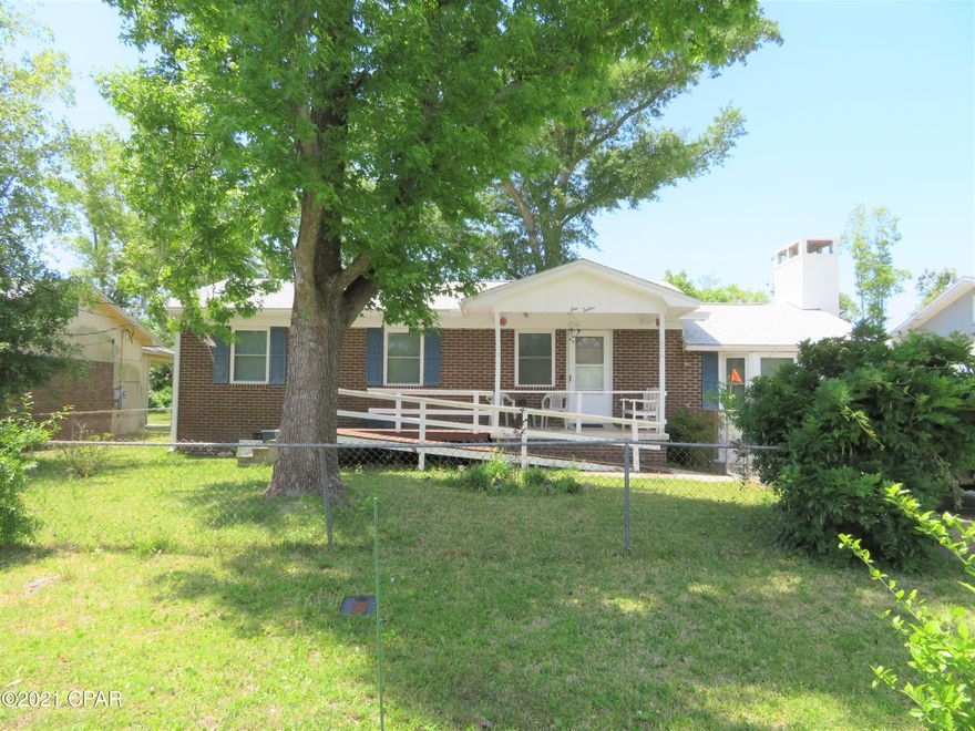 What an opportunity!  Two homes for the price of one!  Live in one and rent the other to help make the mortgage.  Or use one as a Mother-in-Law Quarters or guest house.  The main home has 3 bedrooms and 2 bathrooms with a large sunken great room with a fireplace.  The kitchen and dining area are open to the great room with built in shelving for storage.   One of the bathrooms has even had a walk in tub installed. The guest house has 2 bedrooms and bathroom and a full kitchen and living room.  Seller previously rented this for $1,000 a month.  The yard is fenced for pets.  Both homes have new roofs.  The main home had new windows installed a couple of years ago. The home is sold As Is and would be super cute with some TLC.  Seller will provide a $5K credit towards painting or updates!