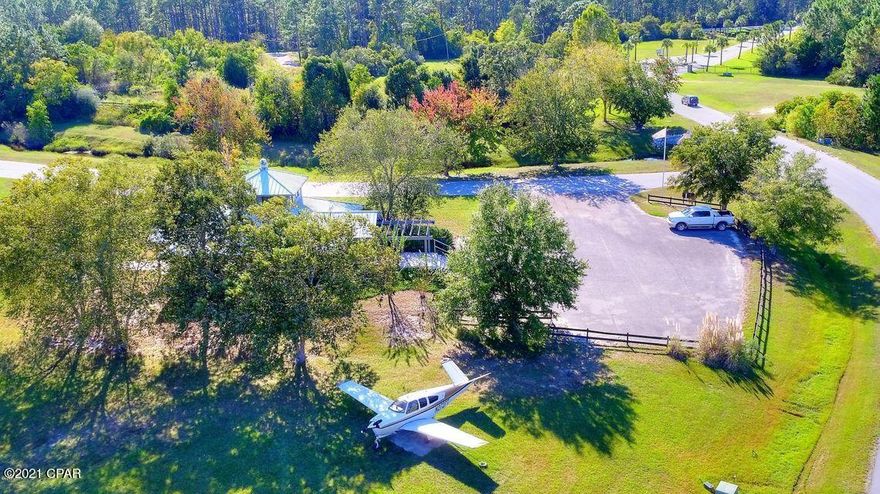 3/4+/- acre lot located in Sandy Creek Airpark.

Sandy Creek Airpark is one of the most desirable fly-in communities in the southeast. This beautifully grassed lot is directly on the north side of Airway Street, cleared and ready to build. It is one of the few available lots that is NOT IN A FLOOD ZONE. The Airpark is a gated community and has a 3800 foot paved and lighted runway and uncontrolled airspace. It also has an EAA Chapter right on the field. Located on the eastern edge of the New Orleans Sectional chart, this airpark is perfectly located. If you are flying in the runway elevation is 13 ft and the unicom frequency is 122.9. If looking for a location to build a fly-in dream home, this is it.