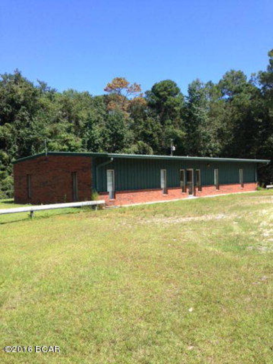 One acre prime commercial property in Calhoun County. This 2,130 sq ft building features 5 offices, conference room, kitchen, file room two bathrooms and large parking lot. Priced to sell.